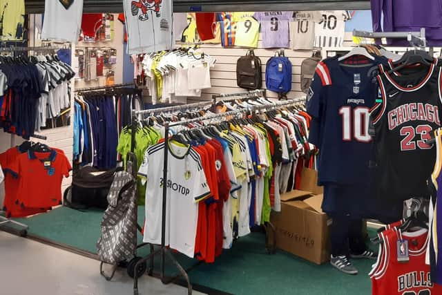 Four tonnes of fake football shirts have been seized by cops during raids ahead of the World Cup - worth a whopping £500,000. Cops raided lock ups and houses across the country in a crackdown on counterfeit goods, which they said are linked to organised criminal groups.