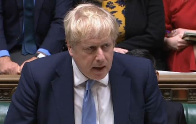 Prime Minister Boris Johnson delivers a statement to MPs in the House of Commons on the Sue Gray report (PA)