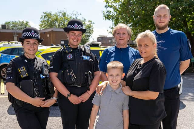 Left to right: (back row) Thurrock Engagement Sergeant, Amelia Moore, Thurrock Children and Young Person's officer, Rachael Johns, Essex Police call taker, Ruth Potts, Essex Police Control Room Supervisor, Adam Taylor. Front row: Ronnie-Lee Gray and his mum Becky