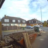 Man covers himself in soil after wheelbarrow tips over.