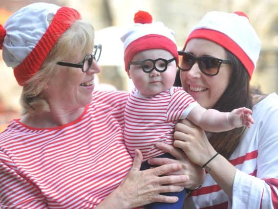 Six-month-old Ivy Eastwood with Sandra and Nadine Cuddy..