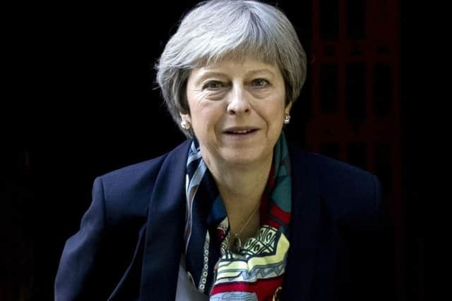 Prime Minister Theresa May leaves after attending a church service near to her Maidenhead constituency.