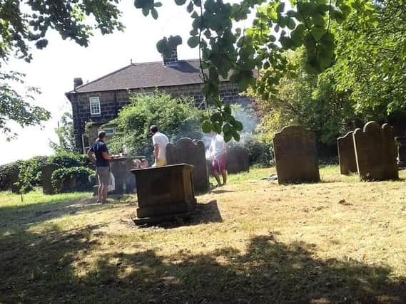 A barbecue was held on a tombstone