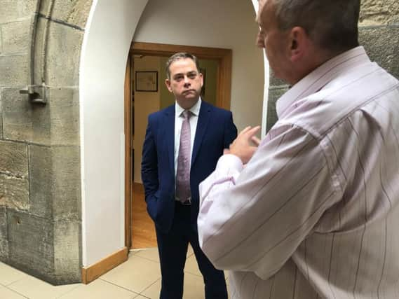 Nigel Adams MP at St George's Crypt. Credit: Department of Communities.