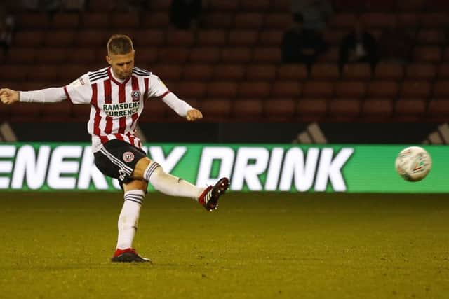 Oliver Norwood misses his penalty.