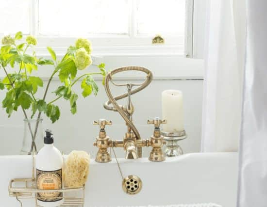 The bathroom with roll top bath.