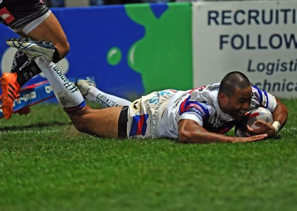 Bill Tupou scores against St Helens