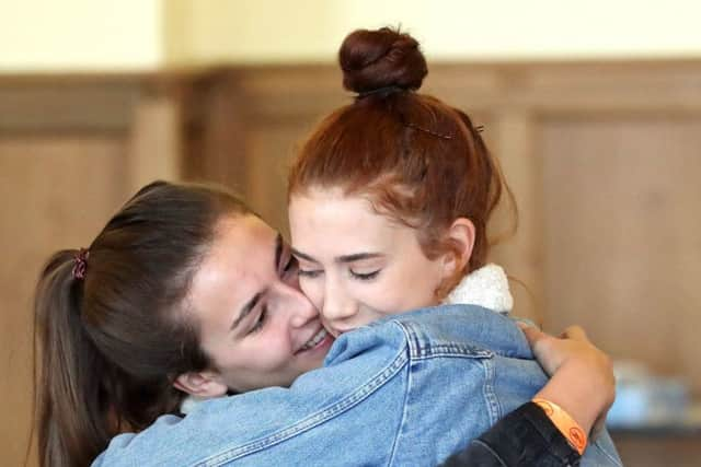 Alicia Lake (left) and Milly Lake collect their GCSE results at the Mount School, in York. PRESS ASSOCIATION Photo. Picture date: Thursday August 23, 2018. See PA story EDUCATION GCSE. Photo credit should read: Danny Lawson/PA Wire