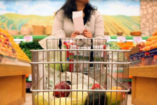 Woman grocery shopping