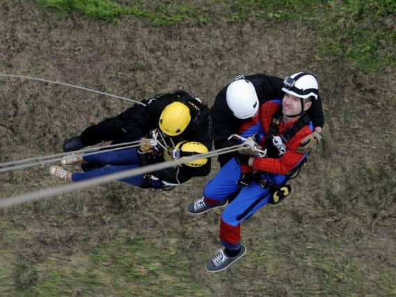 Jason on a previous challenge - abseiling off the Humber Bridge