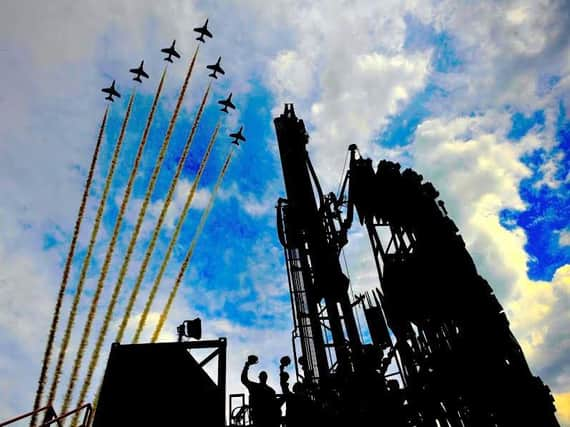 The Red Arrows flying over Sirius Minerals exploration drilling rig at its North Yorkshire polyhalite project