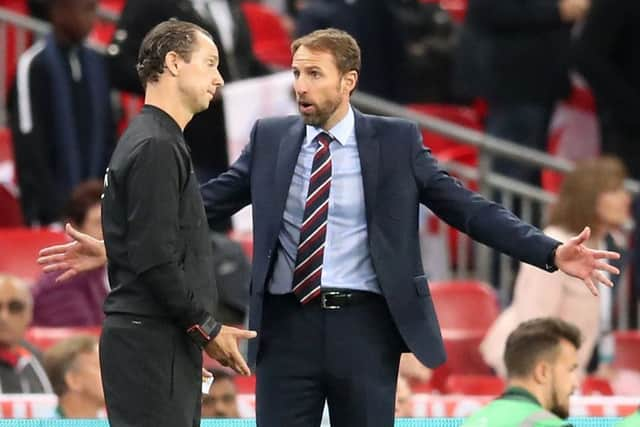 WHY? England manager Gareth Southgate (right) reacts after a disallowed goal . Picture: Adam Davy/PA