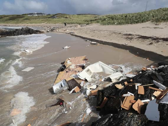 The scene in Claddaghduff, near Clifden in Co Galway where a woman died after her caravan was blown off a cliff. Photo Niall Carson/PA Wire.