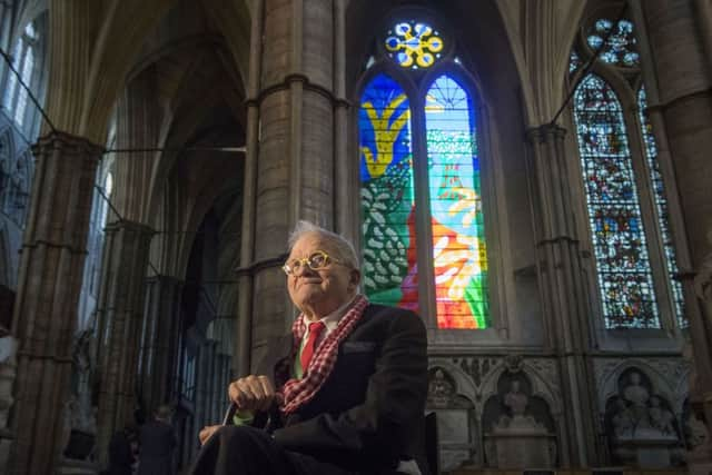 David Hockney in front of The Queen's Window at Westminster Abbey