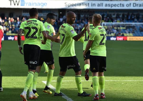 Winner: David McGoldrick, of Sheffield United, celebrates making it 3-2.