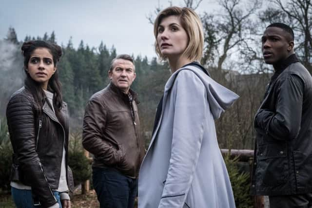 Mandip Gill as Yaz, Bradley Walsh as Graham, Jodie Whittaker as The Doctor, Tosin Cole as Ryan.