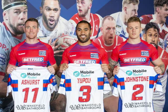 Wakefield Trinitys Matty Ashurst, Bill Tupou and Tom Johnstone with their Dream Team shirts (Picture: Allan McKenzie/SWpix.com).