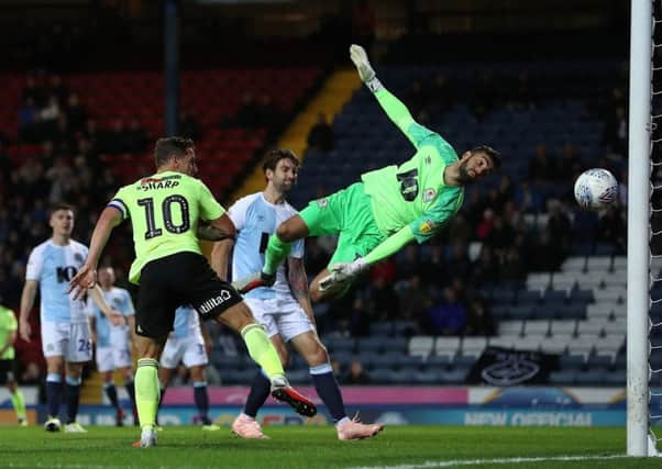 Sheffield United's Billy Sharp scores his second goal against Blackburn Rovers goalkeeper David Raya (Picture: Martin Rickett/PA Wire).