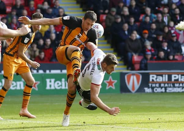 Penalty: Jack OConnell, of Sheffield United, is brought down by Tommy Elphick.