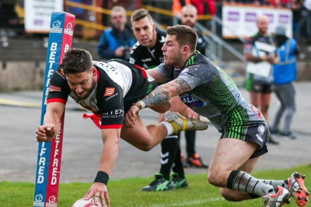 Bradford Bulls' Jy Hitchcox scores one of his three tries. (Alex Whitehead/SWpix.com)