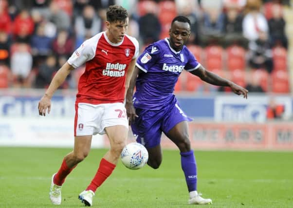 Rotherham's Billy Jones beats Stoke's Peter Etobo. Picture: Dean Atkins