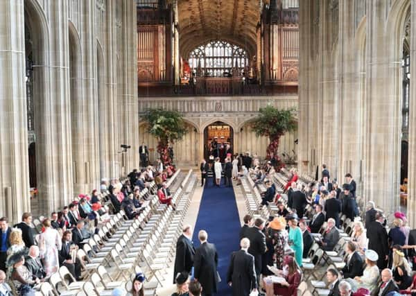 Wedding guests take their seats as they arrive for the wedding of Princess Eugenie to Jack Brooksbank. PIC: PA