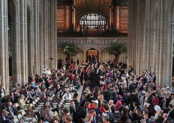 Wedding guests take their seats as they arrive for the wedding of Princess Eugenie to Jack Brooksbank. PIC: PA