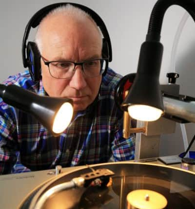 Jon Downing from Sheffield has set up his own record Label Do It Thissen. Jon is pictured in his studio with the lathe cutting equipment producing a record. Picture: Chris Etchells