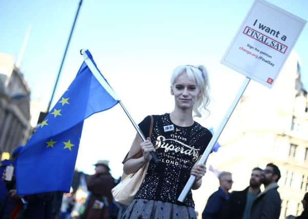 Anti-Brexit campaigners take part in the People's Vote March for the Future in London, a march and rally in support of a second EU referendum.