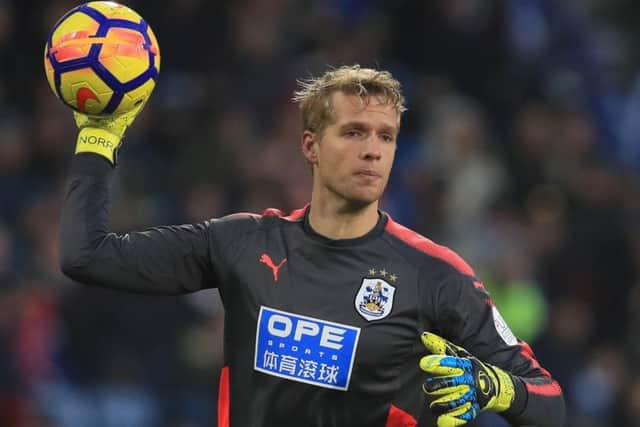 Goalkeeper Jonas Lossl says Huddersfield Towns players appreciate chairman Dean Hoyles unequivocal backing of head coach David Wagner (Picture: Mike Egerton/PA Wire).