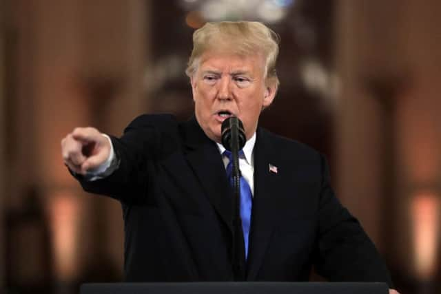 President Donald Trump speaks during his tetchy press conference following the mid-term elections.