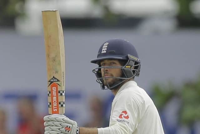 England's Ben Foakes celebrates scoring a half century during the first day. (AP Photo/Eranga Jayawardena)