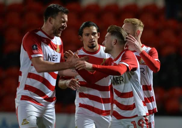 Four-play: Alfie May celebrates his fourth goal against Chorley.