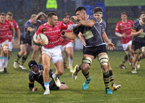 Gift-wrapped: Tom James, left, and Doncaster Knights played in a festive kit on Saturday but presented Nottingham with victory. (Pictures: Marie Caley)