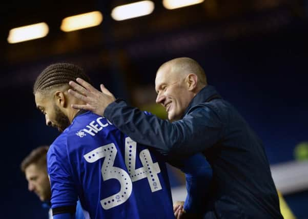 Happy Owls caretaker boss Lee Bullen with match winner Michael Hector....Pic Steve Ellis