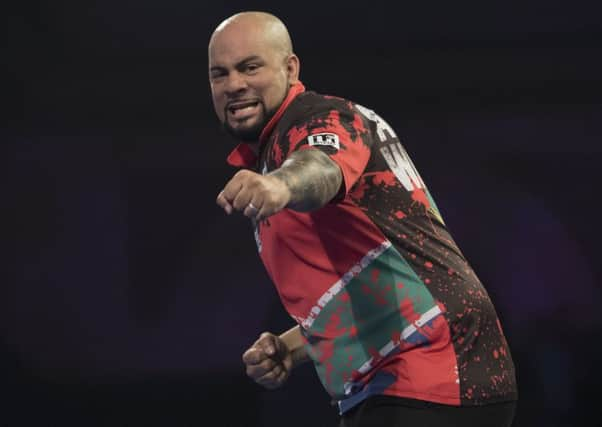 WILLIAM HILL WORLD DARTS CHAMPIONSHIP 2019 ALEXANDRA PALACE, LONDON PIC;LAWRENCE LUSTIG. DEVON PETERSEN  IN ACTION