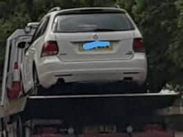 A car being seized by police (Photo: WYP)