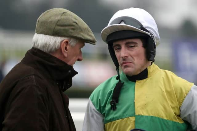 Brian Hughes has enjoyed a long association with leading owner Trevor Hemmings and his racing manager Mick Meagher (pictured).