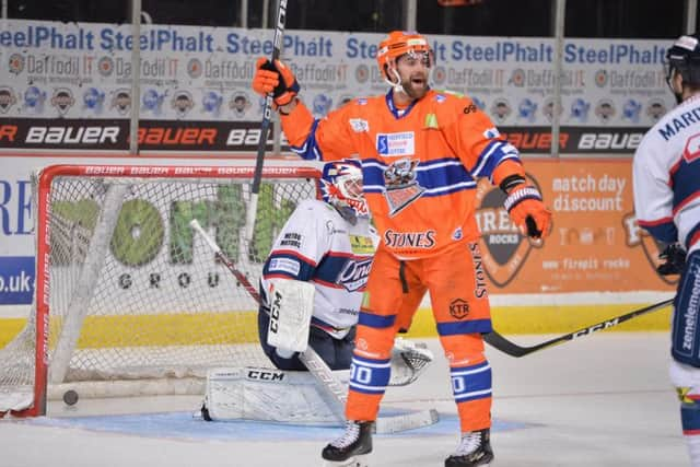 NOT ENOUGH: John Armstrong celebrates tipping-in Sheffield's second goal against Dundee. Picture: Dean Woolley,