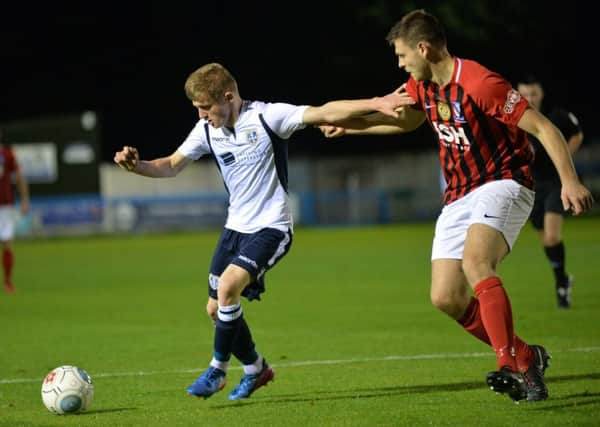 Guiseley goalscorer Scott Smith, left.