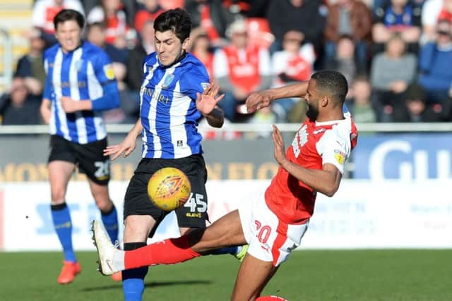 Rotherham's Michael Ihiekwe challenges Wednesday's Fernando Forestieri resulting in a yellow card. (Picture: Steve Ellis)