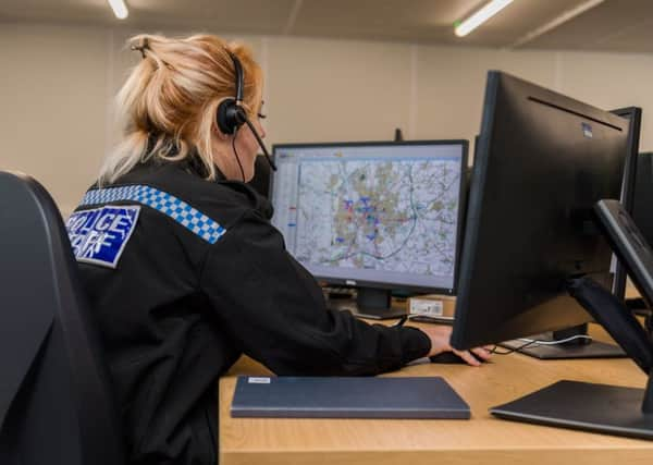 An officer inside North Yorkshire Police's control room.