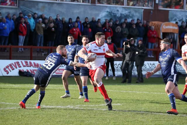 Hull KR captain Joel Tomkins goes around brother Sam to score a try in Rovers' 18-16 defeat against Catalans. (PIC: HULL KR)