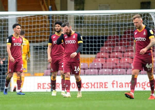 Oh no: 
Bradford's players after Blackpool's fourth goal. Pictures: Jonathan Gawthorpe