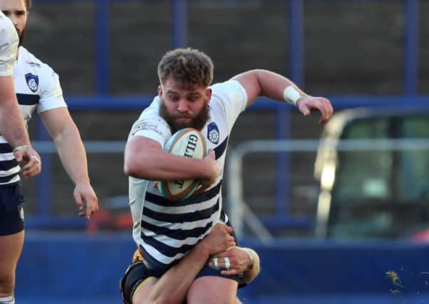 OVER THE LINE: Carnegie try-scorer Joe Buckle