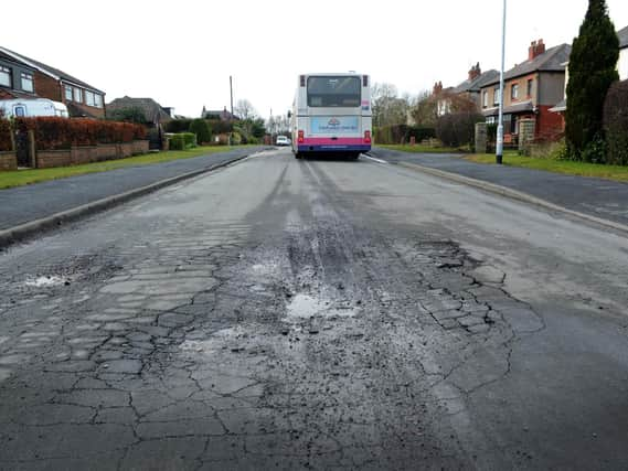 Pothole on Rakehill Road, Scholes, near Leeds in 2011.