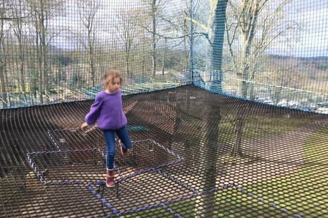 Maisie Craven looks to find her balance doing Hopscotch up in the trees.