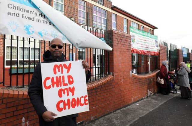 Parents and pupils stage protest outside Parkfield community school Saltley, Birmingham, demanding LGBT lessons are banned.