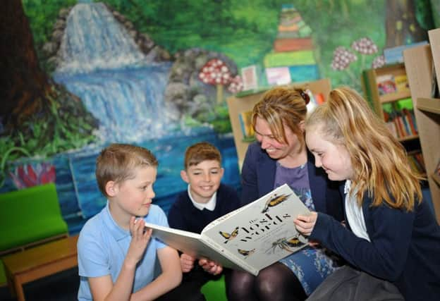 Headteacher Pippa Robinson,with pupils Ryan Elliott, 11, Alfie Buckley, 10, and Ania Sobieralski, nine, at Pheasant Bank Academy, Doncaster