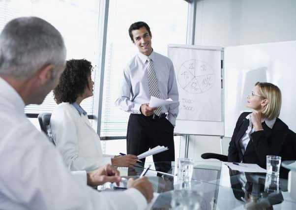 Mandatory Credit: Photo by OJO Images / Rex Features ( 822444a ) MODEL RELEASED Group of office workers in a boardroom presentation VARIOUS